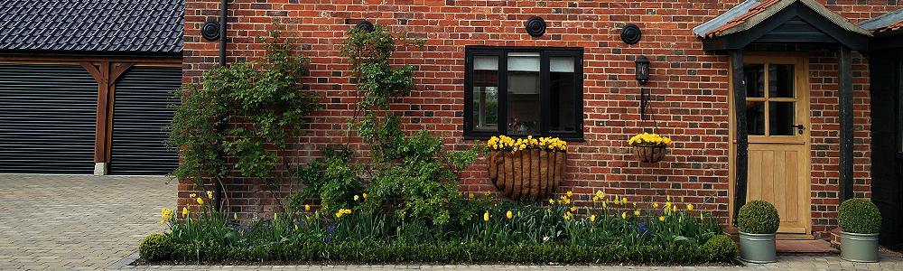 Click here for cool planting around a barn conversion